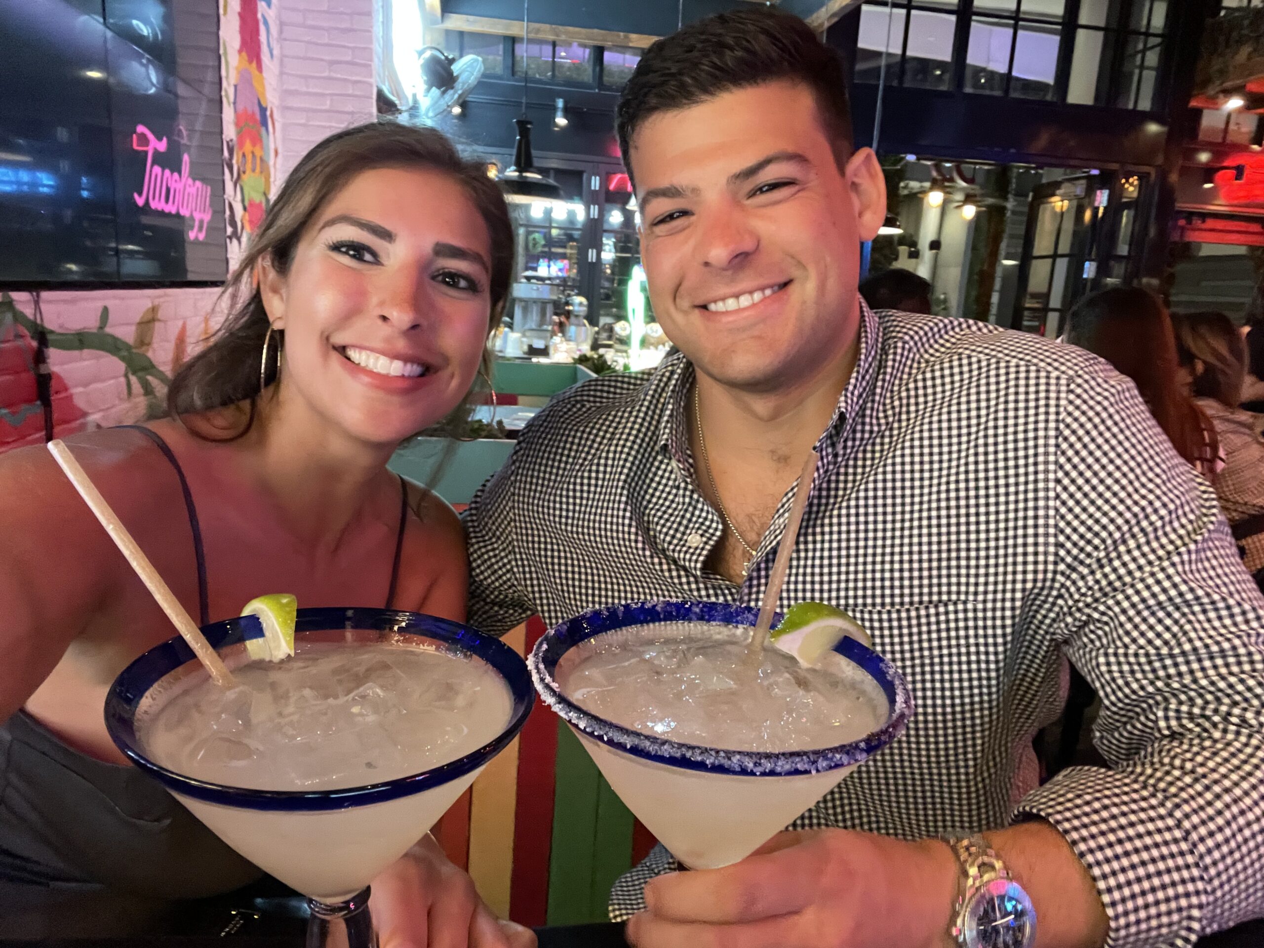A couple drinking margaritas in miami